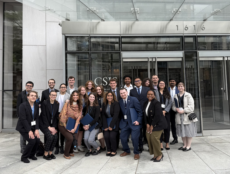 Students pose outside CSIS in Washington, DC