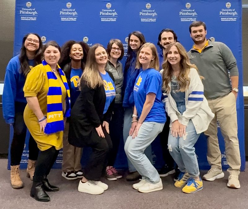 Alumni, students, and SPIA staff at Homecoming