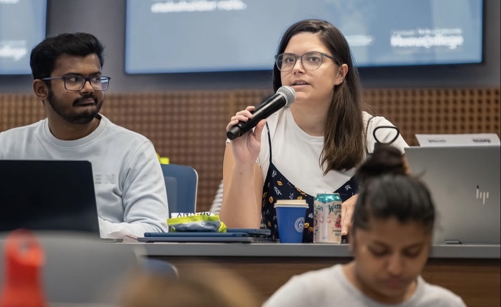 Student asks a question at a SPIA-Heinz event
