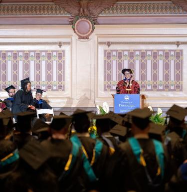 Dean Slotterback addresses the crowd at Spring Commencement